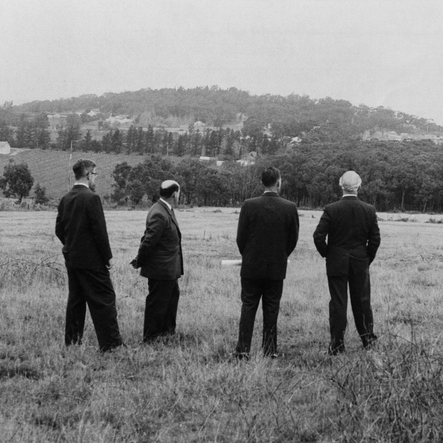 Website image 1 founders looking up to the hills